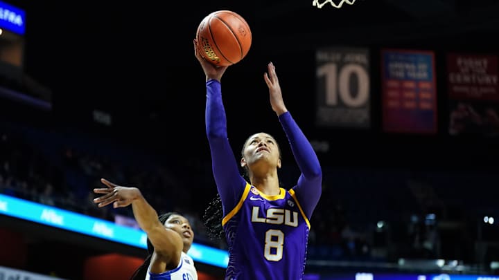 Dec 17, 2024; Uncasville, Connecticut, USA; LSU Lady Tigers forward Jersey Wolfenbarger (8) drives the ball to the basket against Seton Hall Pirates guard Amari Wright (22) in the first half at Mohegan Sun Arena. Mandatory Credit: David Butler II-Imagn Images