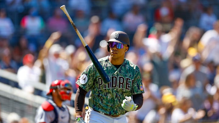 Sep 24, 2023; San Diego, California, USA;  San Diego Padres left fielder Juan Soto (22) flips his bat after hitting a three run home run in the first inning against the St. Louis Cardinals at Petco Park. Mandatory Credit: David Frerker-Imagn Images