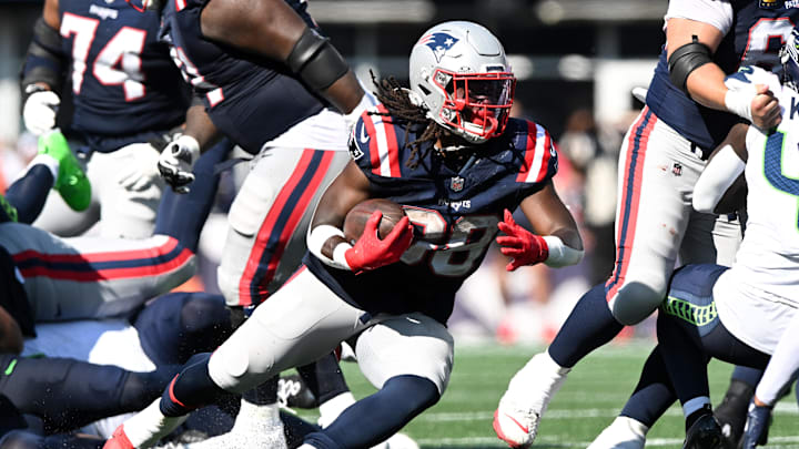 Sep 15, 2024; Foxborough, Massachusetts, USA;  New England Patriots running back Rhamondre Stevenson (38) runs with the ball against the Seattle Seahawks during the second half at Gillette Stadium.