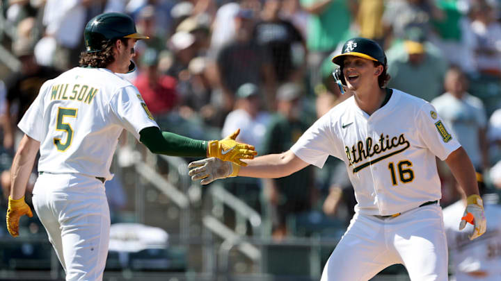 Sep 14, 2025; West Sacramento, California, USA; Athletics first baseman Nick Kurtz (16) celebrates with shortstop Jacob Wilson (5) after hitting a two-run home run against the Cincinnati Reds during the fifth inning at Sutter Health Park. Mandatory Credit: Dennis Lee-Imagn Images