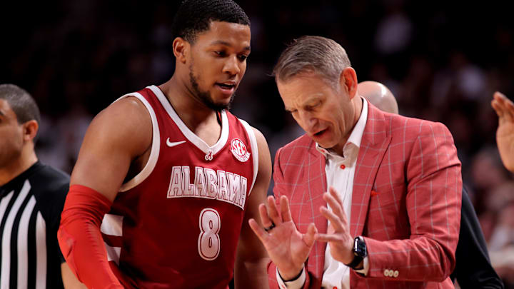 Jan 11, 2025; College Station, Texas, USA; Alabama Crimson Tide head coach Nate Oats talks with Alabama Crimson Tide guard Chris Youngblood (8) during a timeout against the Texas A&M Aggies during the second half at Reed Arena. Mandatory Credit: Erik Williams-Imagn Images Jan 11, 2025; College Station, Texas, USA; Alabama Crimson Tide head coach Nate Oats talks with Alabama Crimson Tide guard Chris Youngblood (8) during a timeout against the Texas A&M Aggies during the second half at Reed Arena. Mandatory Credit: Erik Williams-Imagn Images