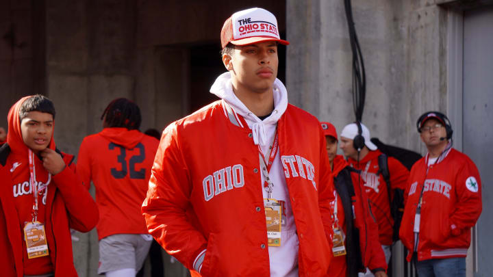Recruit Tavien St. Clair watches Ohio State warm up before playing Penn State Oct. 21, 2023 at Ohio Stadium.