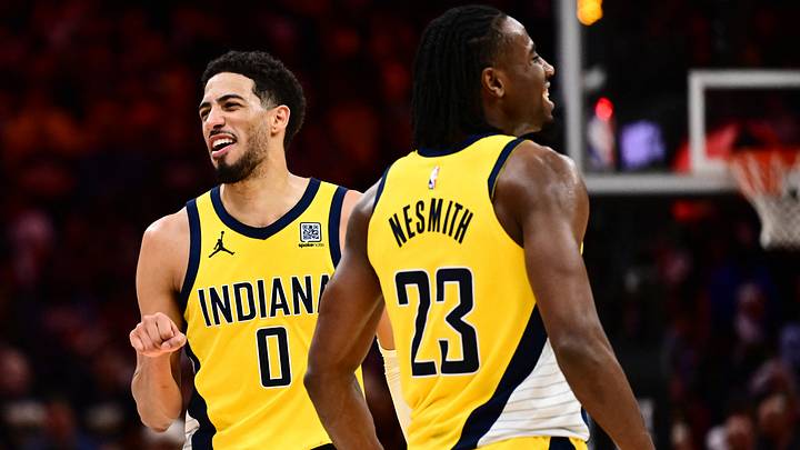 May 13, 2025; Cleveland, Ohio, USA; Indiana Pacers forward Aaron Nesmith (23) and guard Tyrese Haliburton (0) celebrate during the second half of game five against the Cleveland Cavaliers in the second round for the 2025 NBA Playoffs at Rocket Arena. Mandatory Credit: Ken Blaze-Imagn Images May 13, 2025; Cleveland, Ohio, USA; Indiana Pacers forward Aaron Nesmith (23) and guard Tyrese Haliburton (0) celebrate during the second half of game five against the Cleveland Cavaliers in the second round for the 2025 NBA Playoffs at Rocket Arena. Mandatory Credit: Ken Blaze-Imagn Images