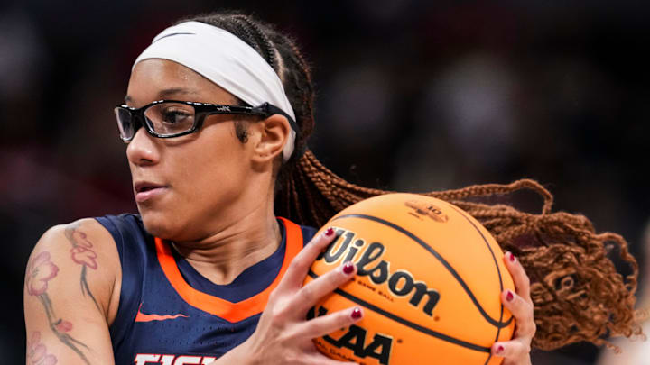 Illinois Fighting Illini guard Aaliyah Guyton (1) drives to the basket Friday, March 6, 2026, during a Big Ten women's basketball tournament game at Gainbridge Fieldhouse in Indianapolis.