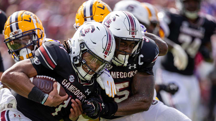 Sep 14, 2024; Columbia, South Carolina, USA; South Carolina Gamecocks quarterback Robby Ashford (1) runs into running back Raheim Sanders (5) during the fourth quarter against the LSU Tigers at Williams-Brice Stadium. Mandatory Credit: Scott Kinser-Imagn Images