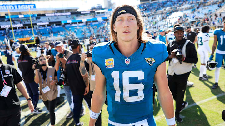 Jacksonville Jaguars quarterback Trevor Lawrence (16) walks on the field trying to find Seattle Seahawks quarterback Sam Darnold (14), not shown, after the game of an NFL football matchup, Sunday, Oct. 12, 2025, at EverBank Stadium in Jacksonville, Fla. The Seahawks defeated the Jaguars 20-12. [Corey Perrine/Florida Times-Union]
