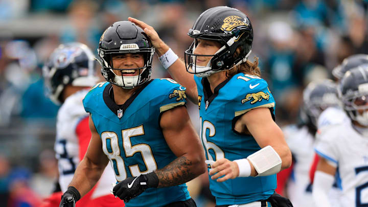Jacksonville Jaguars tight end Brenton Strange (85) is congratulated by quarterback Trevor Lawrence (16) during the second quarter of an NFL football matchup at EverBank Stadium, Sunday, Jan. 4, 2026, in Jacksonville, Fla. [Corey Perrine/Florida Times-Union]