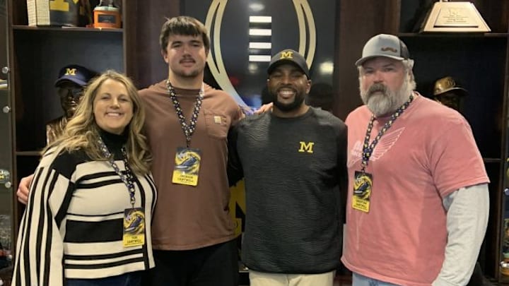Cantwell family at Michigan with Sherrone Moore.
