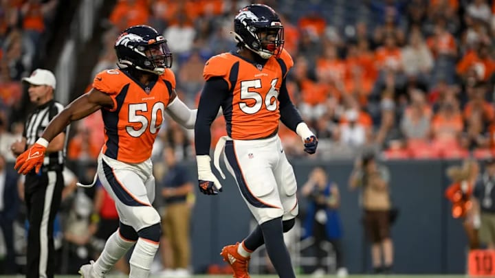 DENVER, CO – AUGUST 13: Baron Browning (56) of the Denver Broncos celebrates a tackle with Jonas Griffith (50) against the Dallas Cowboys during the first quarter at Empower Field at Mile High on Saturday, August 13, 2022. (Photo by AAron Ontiveroz/The Denver Post)