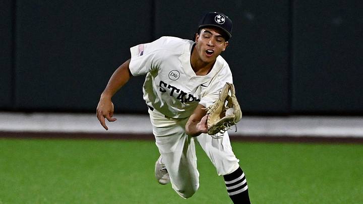 Former Vanderbilt centerfielder David Mendez (20) catches a fly ball for an out during the second inning of an NCAA college baseball fall intrasquad game at Hawkins Field. 