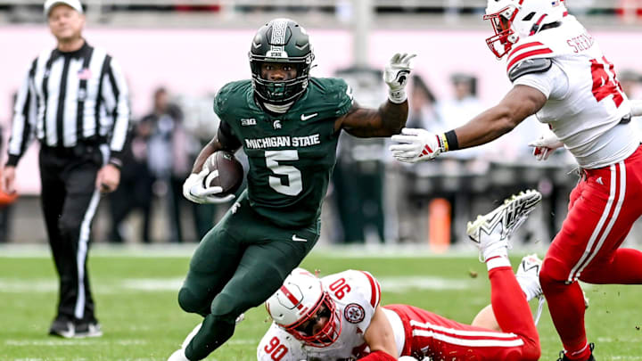 Michigan State's Nathan Carter runs for a gain against Nebraska during the fourth quarter on Saturday, Nov. 4, 2023, at Spartan Stadium in East Lansing.
