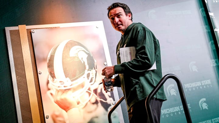 Michigan State coach Jonathan Smith leaves the podium after his press conference on the first