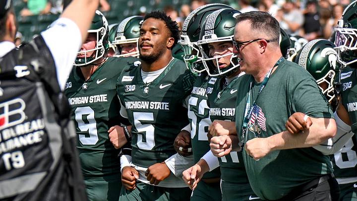From left, Michigan State’s Jordan Hall, Alessio Milivojevic and head coach Pat Fitzgerald walk the end zone with the team before the football game against Eastern Michigan on Saturday, Sept. 12, 2026, at Spartan Stadium in East Lansing. From left, Michigan State’s Jordan Hall, Alessio Milivojevic and head coach Pat Fitzgerald walk the end zone with the team before the football game against Eastern Michigan on Saturday, Sept. 12, 2026, at Spartan Stadium in East Lansing.