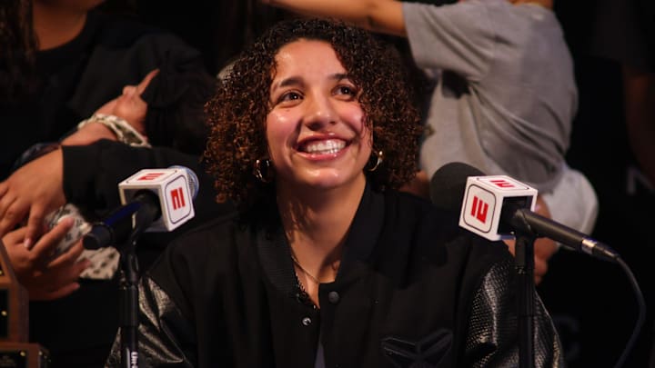 Monterey's Aaliyah Chavez announces she will be playing for the University of Oklahoma in front of an auditorium filled with fans at Monterey High School on Tuesday, March 25, 2025 in Lubbock, TX.