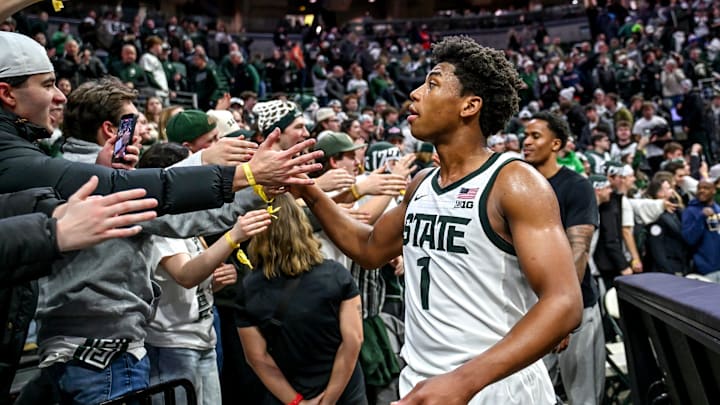 Michigan State's Jeremy Fears Jr. slaps hands with fans after the Spartans overtime win over Illinois on Saturday, Feb. 7, 2026, at the Breslin Center in East Lansing.