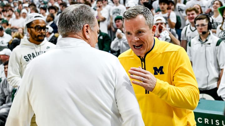 Michigan State's head coach Tom Izzo, left, and Michigan's head coach Dusty May meet before the game on Friday, Jan. 30, 2026, at the Breslin Center in East Lansing.