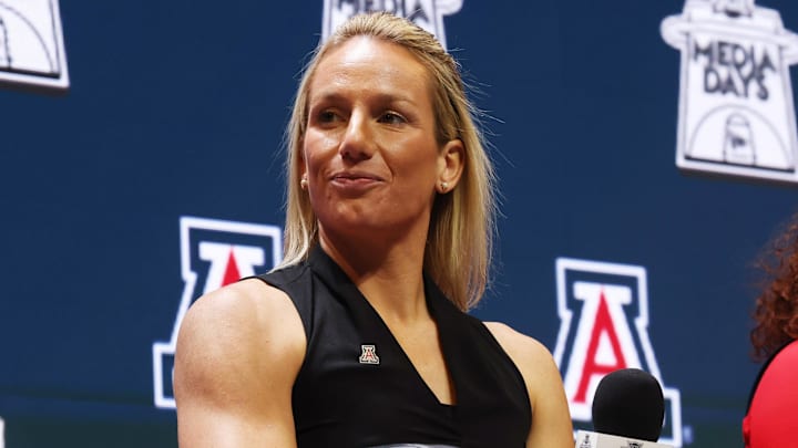 Oct 21, 2025; Kansas City, MO, USA; Arizona head coach Becky Burke speaks to media during Big 12 Womenís Basketball Media Day at T-Mobile Center. Mandatory Credit: Sophia Scheller-Imagn Images