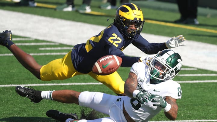 Michigan Wolverines defensive back Gemon Green defends Michigan State Spartans receiver Jalen Nailor during the second quarter at Michigan Stadium in Ann Arbor, Saturday, Oct. 31, 2020.
