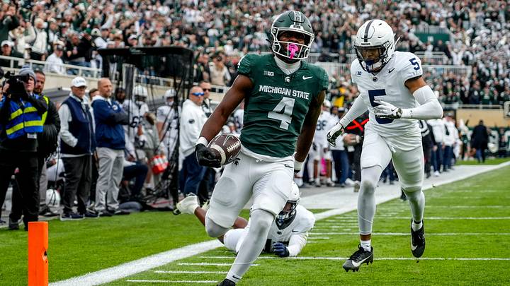 Michigan State's Elijah Tau-Tolliver runs for a touchdown against Penn State during the first quarter on Saturday, Nov. 15, 2025, at Spartan Stadium in East Lansing.