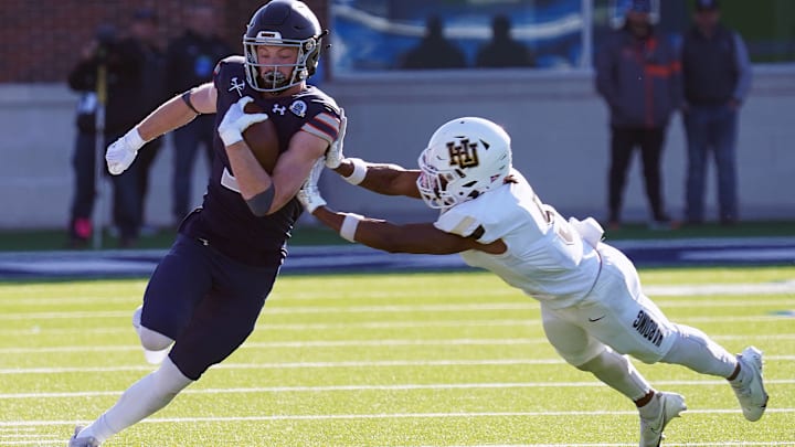 December 18, 2023, McKinney, Texas, USA: December 16, 2023, McKinney, Texas, United States: Harding s linebacker Jordan Mays pushes Colorado s wide receiver Max McLeod out of bounds during the NCAA, College League, USA Division II Football Championship between Harding University and Colorado School of Mines played at McKinney ISD Stadium on Saturday December 16, 2023. in McKinney, Texas, United States McKinney USA - ZUMAe321 20231218_zsa_e321_013 Copyright: xJavierxVicenciox xEyepixxGroupx