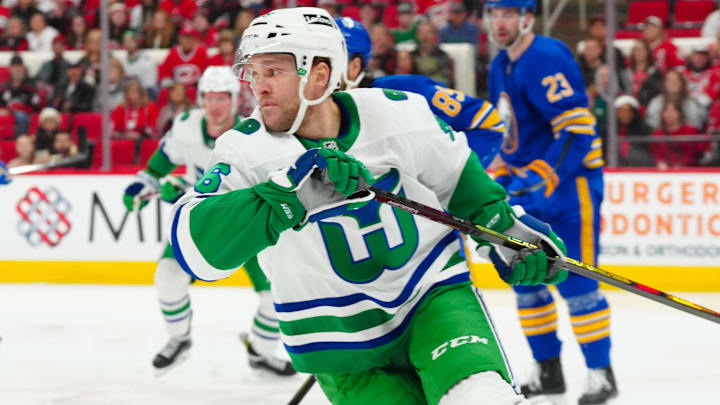 Feb 27, 2025; Raleigh, North Carolina, USA;  Carolina Hurricanes right wing Mikko Rantanen (96) skates against the Buffalo Sabres during the first period at Lenovo Center. Mandatory Credit: James Guillory-Imagn Images