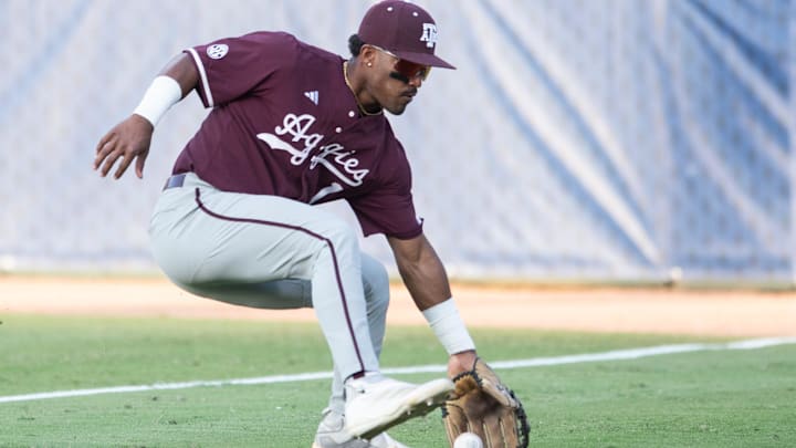 Texas A&M Aggies' Jamal George (1) scoops a ground ball as LSU Tigers take on Texas A&M Aggies during the SEC baseball tournament at Hoover Met in Birmingham, Ala., on Friday, May 23, 2025.