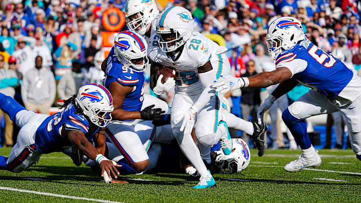 Bills Dorian Williams, Ed Oliver and Greg Rousseau see Miami's De'Von Achane running with the ball and turn to try and tackle him during first half action at Highmark Stadium on Nov. 3, 2024. Bills Dorian Williams, Ed Oliver and Greg Rousseau see Miami's De'Von Achane running with the ball and turn to try and tackle him during first half action at Highmark Stadium on Nov. 3, 2024.