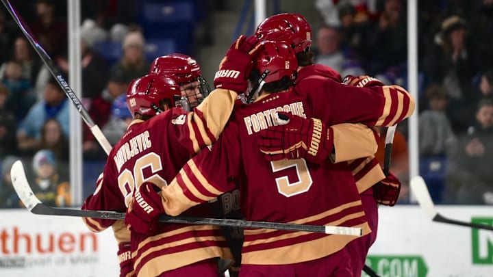 The Boston College men's hockey team celebrating a goal by Dean Letourneau in the first period against UMass Lowell on Dec. 5, 2025. Photo Credit: John Sexton / Boston College Eagles On SI The Boston College men's hockey team celebrating a goal by Dean Letourneau in the first period against UMass Lowell on Dec. 5, 2025. Photo Credit: John Sexton / Boston College Eagles On SI