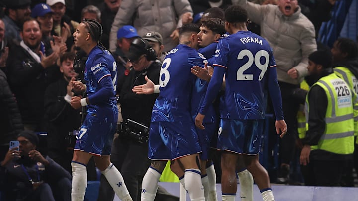 Chelsea celebrating their equaliser against Arsenal in the Premier League.