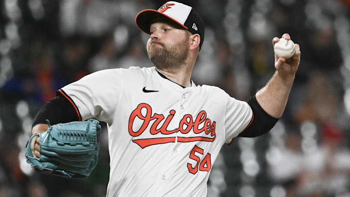 May 29, 2024; Baltimore, Maryland, USA;  Baltimore Orioles relief pitcher Danny Coulombe (54) throws a eighth inning pitch against the Boston Red Sox at Oriole Park at Camden Yards.