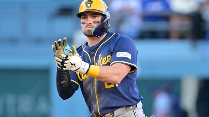 Oct 16, 2025; Los Angeles, California, USA; Milwaukee Brewers third baseman Caleb Durbin (21) reacts at second after hitting a double against the Los Angeles Dodgers in the seventh inning during game three of the NLCS round for the 2025 MLB playoffs at Dodger Stadium. Mandatory Credit: Jayne Kamin-Oncea-Imagn Images