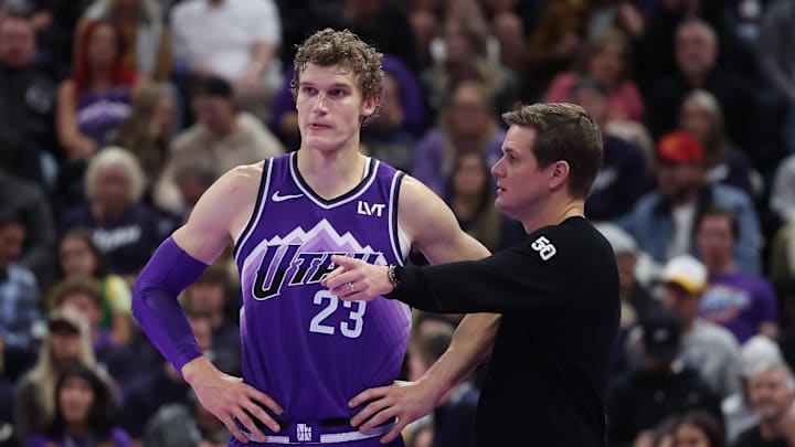 Nov 17, 2023; Salt Lake City, Utah, USA; Utah Jazz forward Lauri Markkanen (23) and head coach Will Hardy speak while the Phoenix Suns shoot free throws in the fourth quarter at Delta Center. Mandatory Credit: Rob Gray-Imagn Images