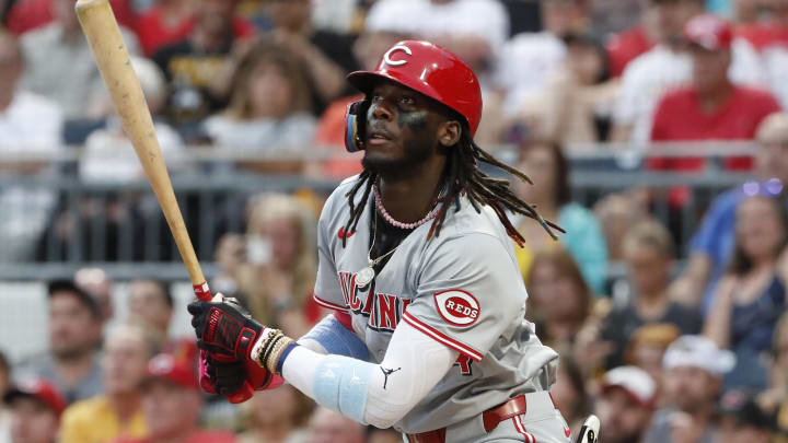 Jun 17, 2024; Pittsburgh, Pennsylvania, USA;  Cincinnati Reds shortstop Elly De La Cruz (44) hits a double against the Pittsburgh Pirates during the third inning at PNC Park. Mandatory Credit: Charles LeClaire-USA TODAY Sports