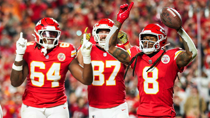 Nov 4, 2024; Kansas City, Missouri, USA; Kansas City Chiefs wide receiver DeAndre Hopkins (8) celebrates with teammates after scoring a touchdown during the first half against the Tampa Bay Buccaneers at GEHA Field at Arrowhead Stadium. Mandatory Credit: Jay Biggerstaff-Imagn Images