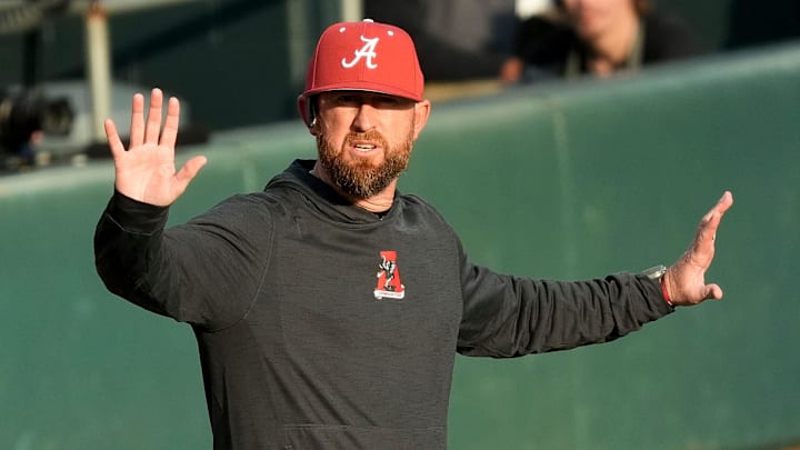 Feb 18, 2025; Tuscaloosa, Alabama, USA; Alabama baseball head coach Rob Vaughn gestures for a timeout during the game with Middle Tennessee State at Sewell-Thomas Stadium.
