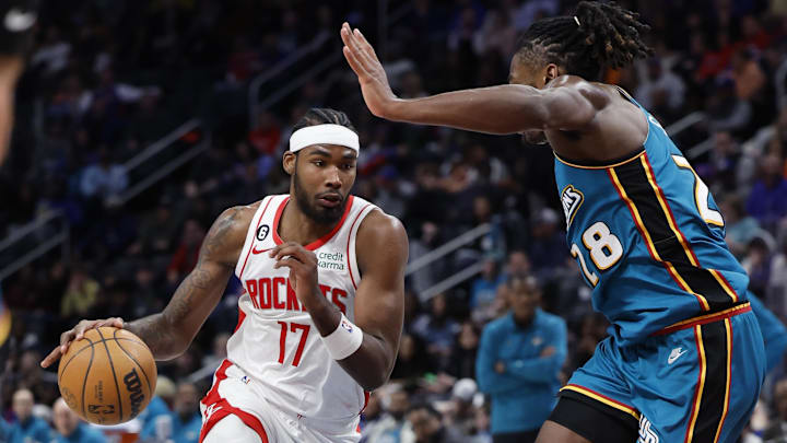 Jan 28, 2023; Detroit, Michigan, USA;  Houston Rockets forward Tari Eason (17) dribbles defended by