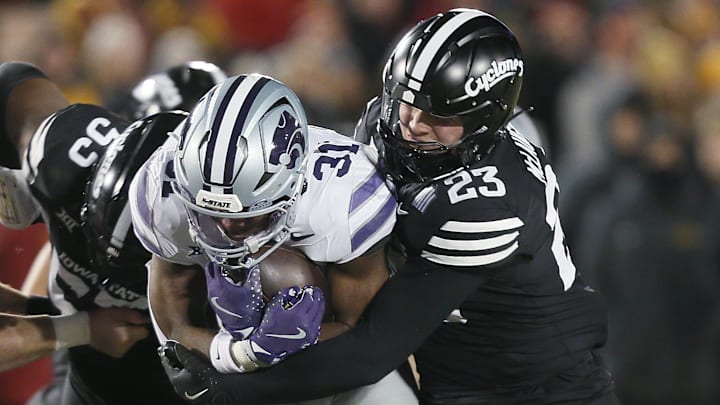 Iowa State Cyclones linebacker Will McLaughlin (23) takes down Kansas State Wildcats running back DJ Giddens (31) during the first quarter in the NCAA football at Jack Trice Stadium on Saturday, Nov. 30, 2024, in Ames, Iowa.