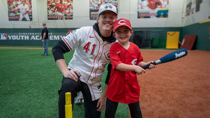 Andrew Abbott Poses With a Child During the Joe Nuxhall Miracle League Andrew Abbott Poses With a Child During the Joe Nuxhall Miracle League