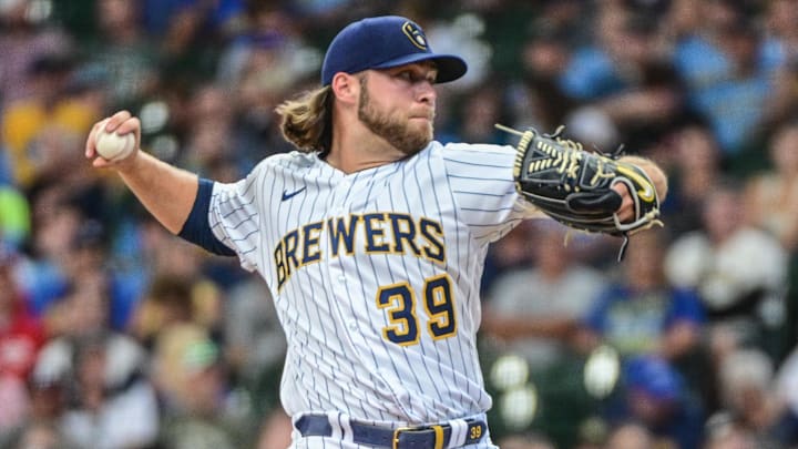 Aug 7, 2022; Milwaukee, Wisconsin, USA;  Milwaukee Brewers pitcher Corbin Burnes (39) throws a pitch in the first inning against the Cincinnati Reds at American Family Field. Mandatory Credit: Benny Sieu-Imagn Images