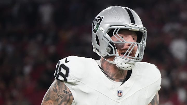 Las Vegas Raiders defensive end Maxx Crosby (98) celebrates his tackle in the backfield against the Arizona Cardinals at State Farm Stadium in Glendale, on Aug. 23, 2025.