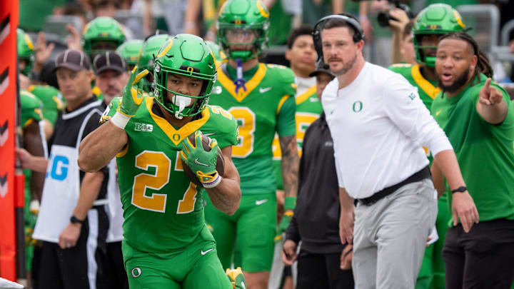 Jayden Limar carries the ball against Oklahoma State in 2025.