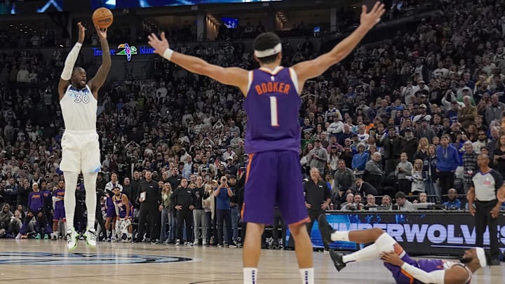 Minnesota Timberwolves forward Julius Randle hits a game-winning 3-pointer against the Phoenix Suns as time expires in the fourth quarter at Target Center in Minneapolis on Nov. 17, 2024. Minnesota Timberwolves forward Julius Randle hits a game-winning 3-pointer against the Phoenix Suns as time expires in the fourth quarter at Target Center in Minneapolis on Nov. 17, 2024.
