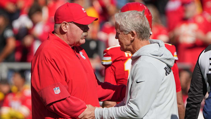 Oct 19, 2025; Kansas City, Missouri, USA; Kansas City Chiefs head coach Andy Reid shakes hands with Las Vegas Raiders head coach Pete Carroll during warmups prior to the game at GEHA Field at Arrowhead Stadium. Mandatory Credit: Denny Medley-Imagn Images