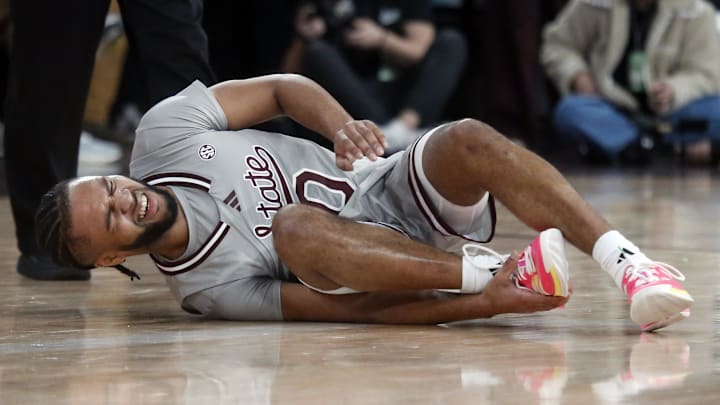 Mississippi State Bulldogs guard Jayden Epps (10) reacts as he grabs his ankle during the second half against the Alabama Crimson Tide at Humphrey Coliseum.
