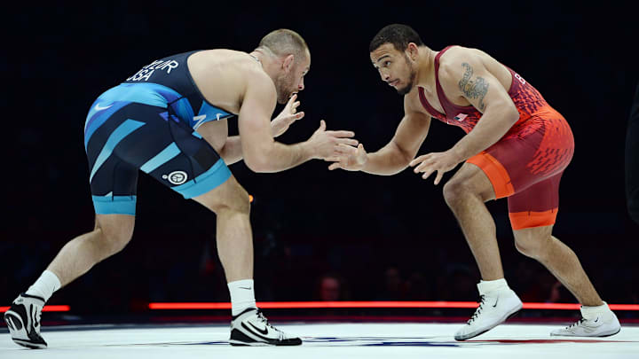 Aaron Brooks, right, faces David Taylor during their second match in the best-of-3 championship finals at 86 kilograms at the U.S. Olympic Wrestling Trials in 2024. 
