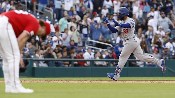 Apr 5, 2026; Washington, District of Columbia, USA; Los Angeles Dodgers right fielder Teoscar Hernandez (37) celebrates while rounding the bases after hitting a solo home run against Washington Nationals relief pitcher Clayton Beeter (L) during the ninth inning at Nationals Park. Mandatory Credit: Geoff Burke-Imagn Images
