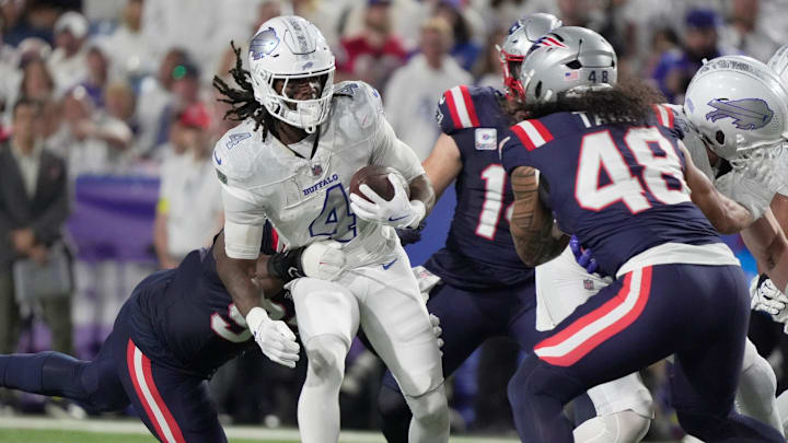 Buffalo Bills running back James Cook carries the ball during firsts half action at Highmark Stadium in Orchard Park on Oct. 5, 2025. Buffalo Bills running back James Cook carries the ball during firsts half action at Highmark Stadium in Orchard Park on Oct. 5, 2025.