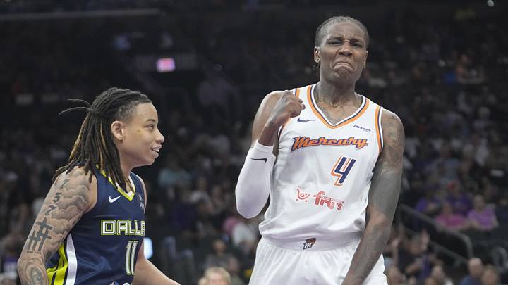 Phoenix Mercury forward Natasha Mack (4) celebrates after blocking a shot by Dallas Wings guard JJ Quinerly (11) during the second quarter at PHX Arena on July 7, 2025. Phoenix Mercury forward Natasha Mack (4) celebrates after blocking a shot by Dallas Wings guard JJ Quinerly (11) during the second quarter at PHX Arena on July 7, 2025.