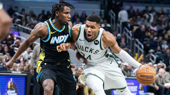 Milwaukee Bucks forward Giannis Antetokounmpo (34) dribbles.
