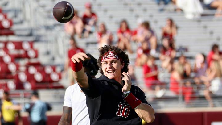 Oklahoma quarterback throws during warmups before the Sooners' contest against New Mexico. Oklahoma quarterback throws during warmups before the Sooners' contest against New Mexico.